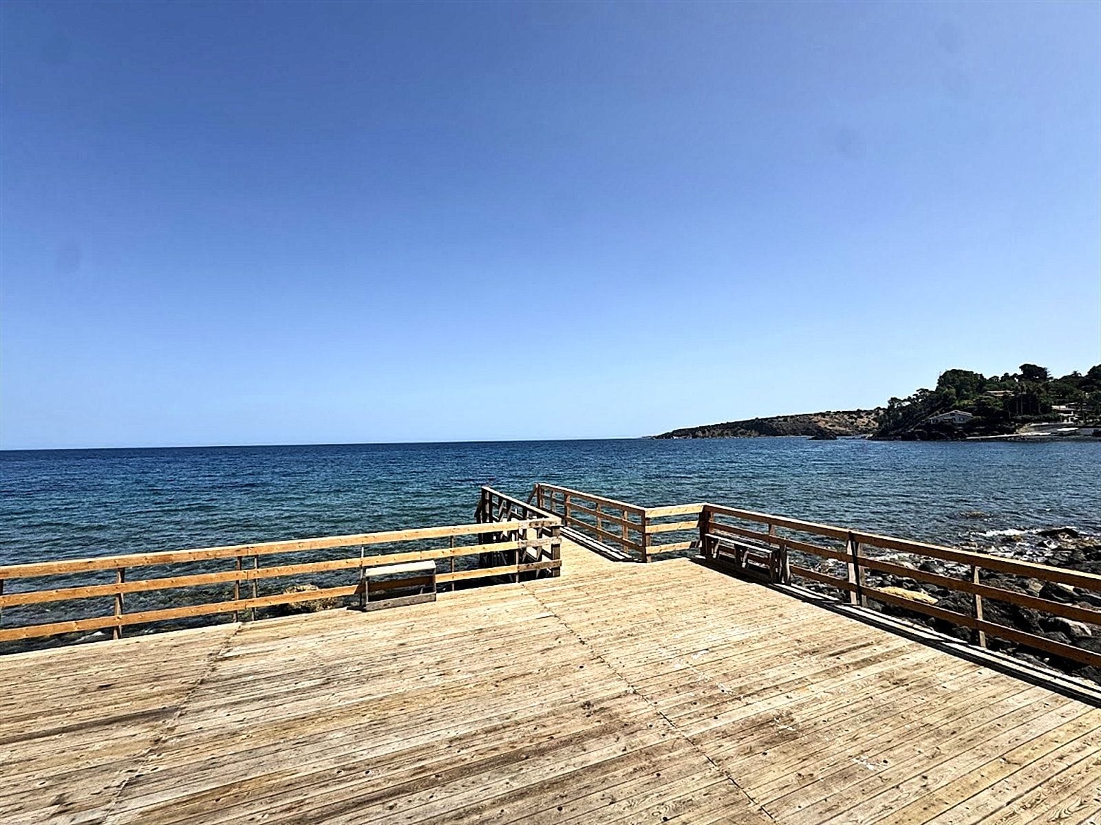 Wooden solarium overlooking the sea